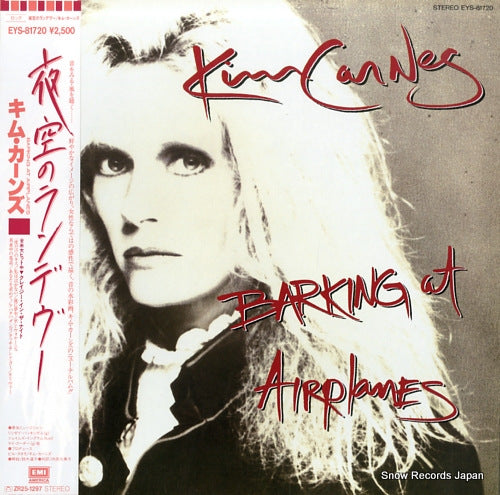 CARNES, KIM barking at airplanes EYS-81720