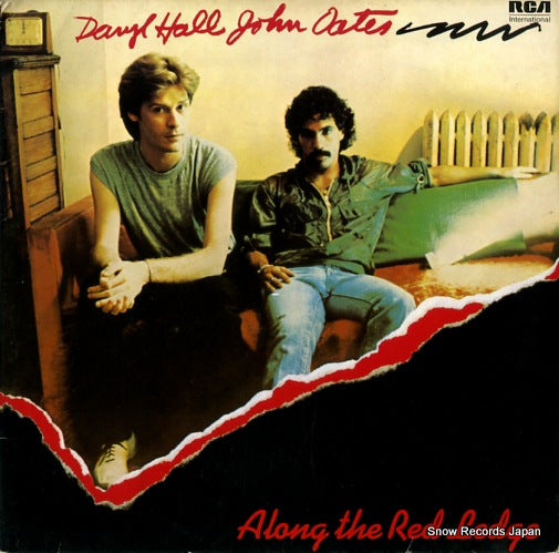 HALL, DARYL, AND JOHN OATES along the red ledge NL84231