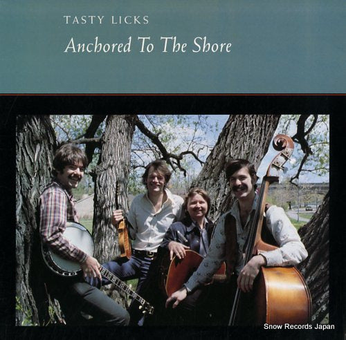 TASTY LICKS anchored to the shore ROUNDER0120