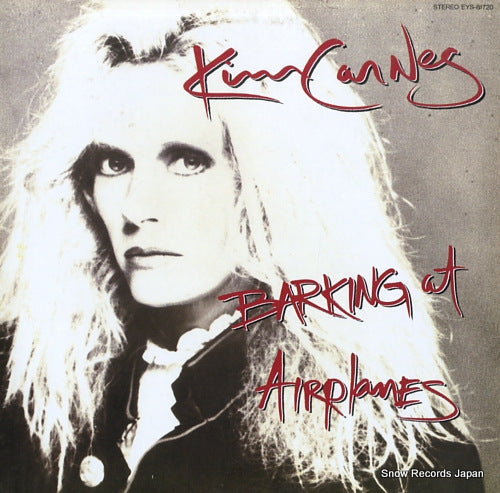 CARNES, KIM barking at airplanes EYS-81720